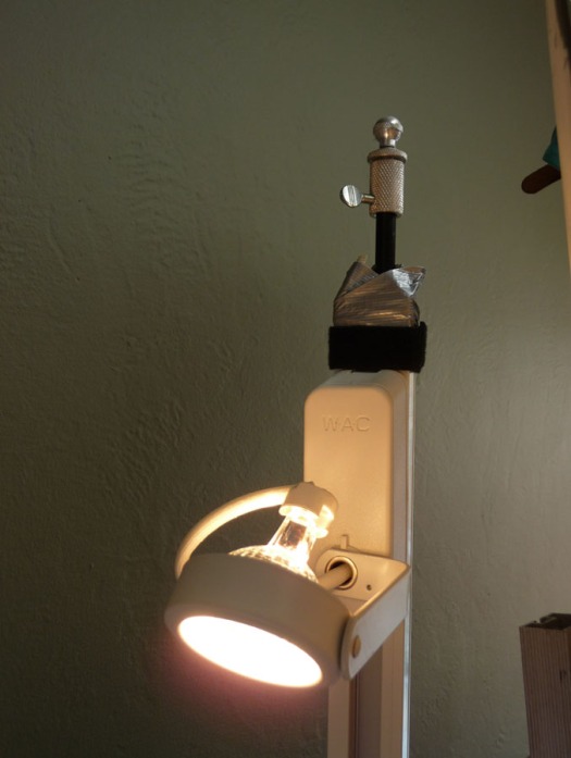 Track light with halogen spot attached to old light stand