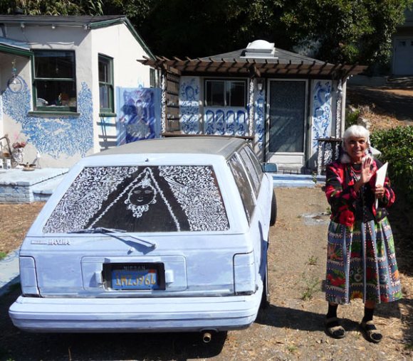 Bebe and her car in front of her house