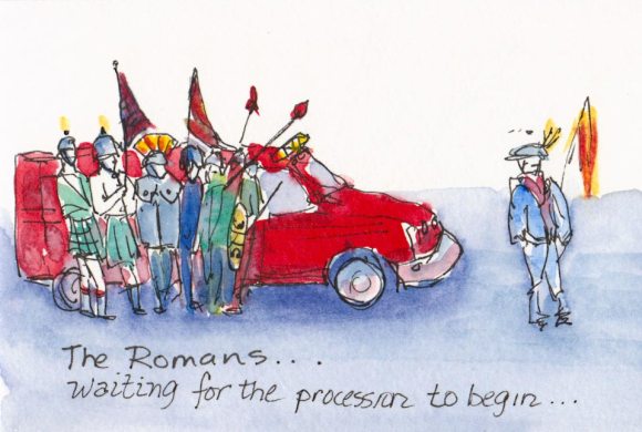 Romans waiting by a small fire truck for a parade to begin