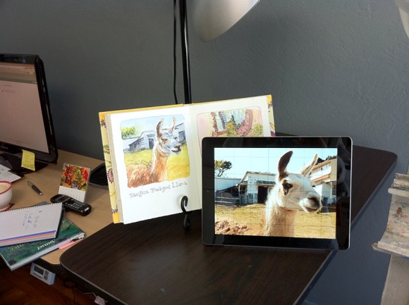 sketchbook and iPad set up by easel