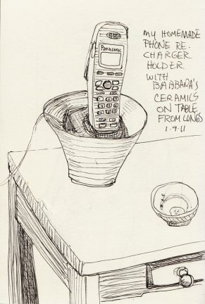 Ceramic bowl that Barbara made that I use to hold my phone and it's charger. Ceramic bowl that Barbara made that I use to hold my phone and it's charger.