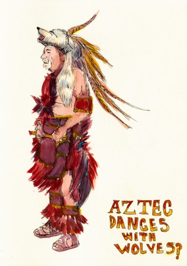 Aztec Dancer wearing animal head, fur and feathers